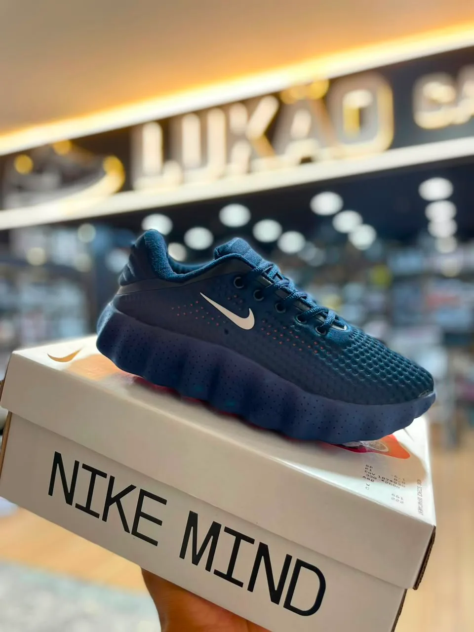 Tênis Nike Mind azul-marinho
